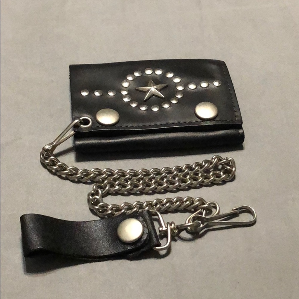 Biker leather wallet with star and studs.
